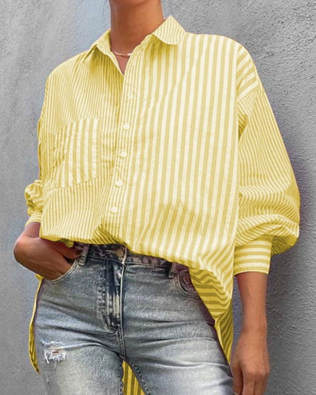 Striped button down long sleeve shirt in yellow, paired with denim jeans.