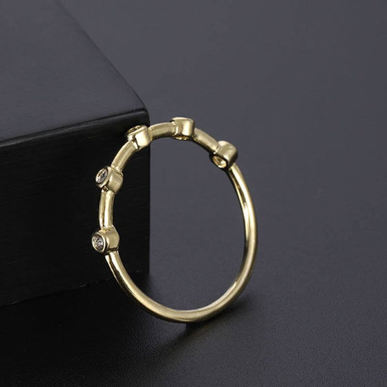 Gold ring zirconium diamond minimalist wedding style.