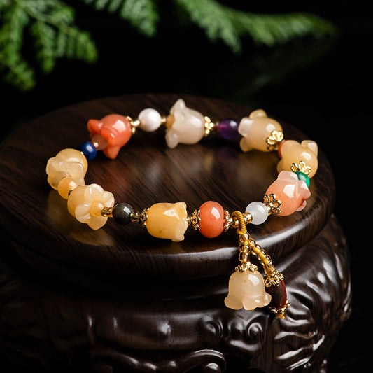 Natural Xinjiang Gold Silk Magnolia BraceletIntroducing our Natural Xinjiang Gold Silk Magnolia Bracelet, made with authentic Jinsi Jade from the Xinjiang province. This exquisite ethnic style bracelet featureBracletPlush Fashions ShopPlush Fashion Shop