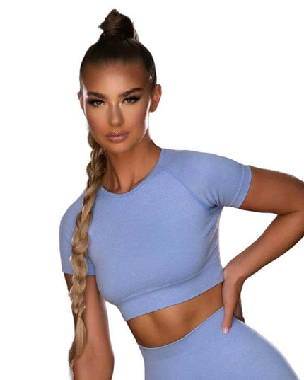 Seamless Yoga Sport Fitness Women Leggings and Short Sleeve Tops in light blue, providing comfort and style for workouts.