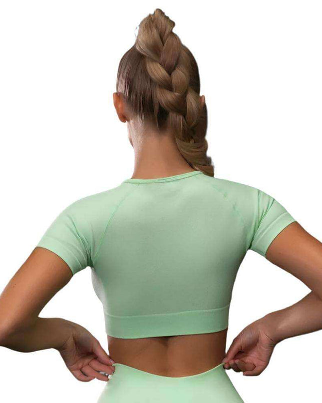 Seamless Yoga Sport Fitness Women Leggings and Short Sleeve Tops in light green, perfect for comfortable workouts.