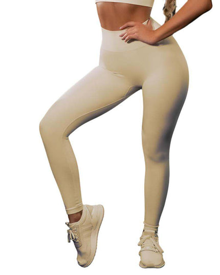 Seamless yoga sport fitness women leggings and short sleeve top in beige color.