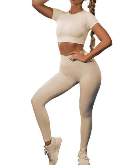 Seamless yoga sport fitness women leggings and short sleeve top in beige.