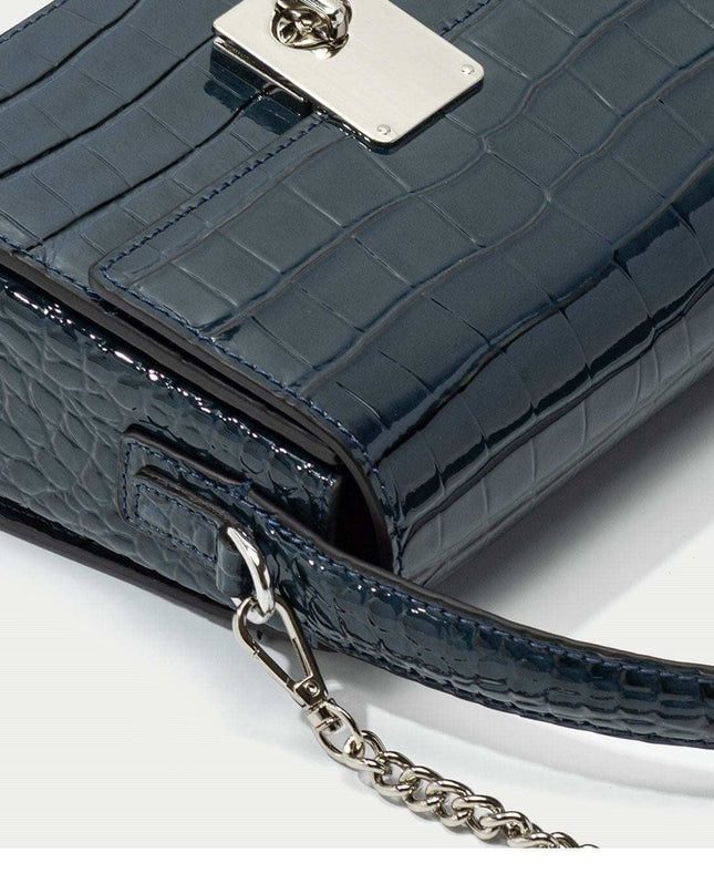 New Leather Handbag with crocodile pattern and metal clasp.