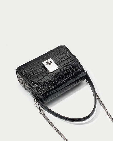 New Leather Handbags Portable Diagonal Bag in black with a trapezoid shape.