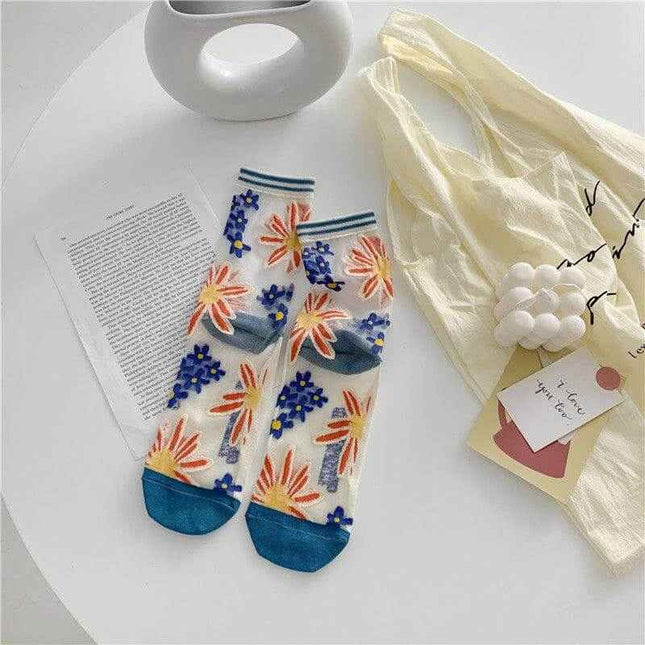 Retro Personality Breathable Glass Silk Socks with bright color floral design on a table with shopping bag.