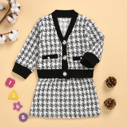 Black long-sleeved temperament two-piece suit skirt plaid children's cExperience sophistication and comfort with our black, long-sleeved two-piece suit skirt for middle and small children. Made with high-quality cotton fabric, this suiBaby clothsPlush Fashions ShopPlush Fashion ShopBlack long-sleeved temperament