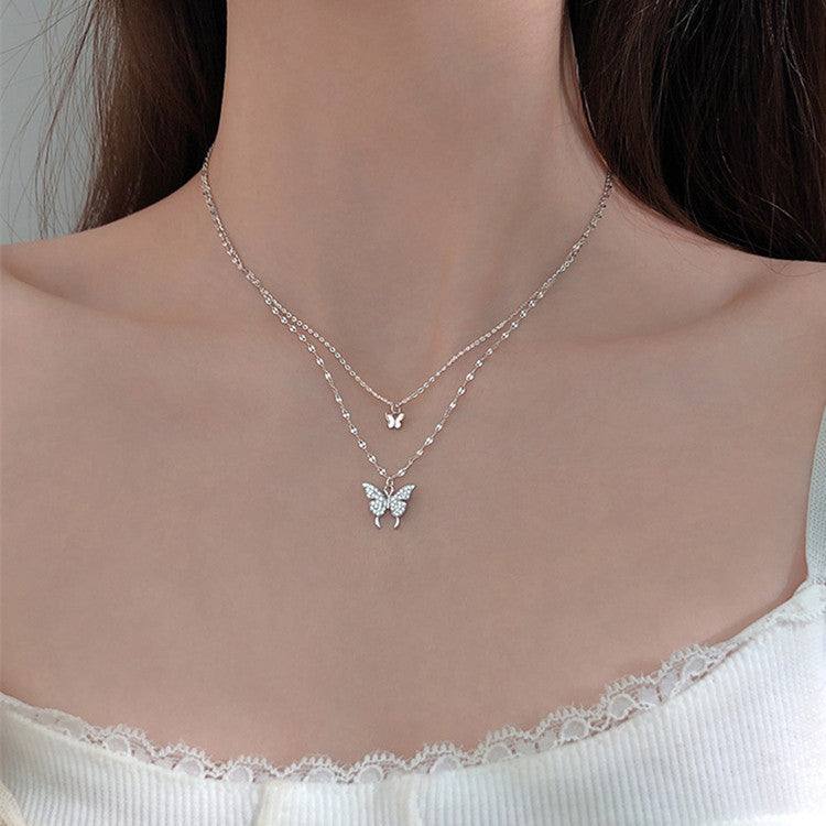 Fashion Jewelry Elegant Silver Color Shiny Butterfly Necklaces Ladies Introducing the stunning "Fashion Jewelry Elegant Silver Color Shiny Butterfly Necklaces" from Plush Fashions Shop Vintage Summer Spice. This exquisite double layer NecklacePlush Fashions ShopPlush Fashion Shop