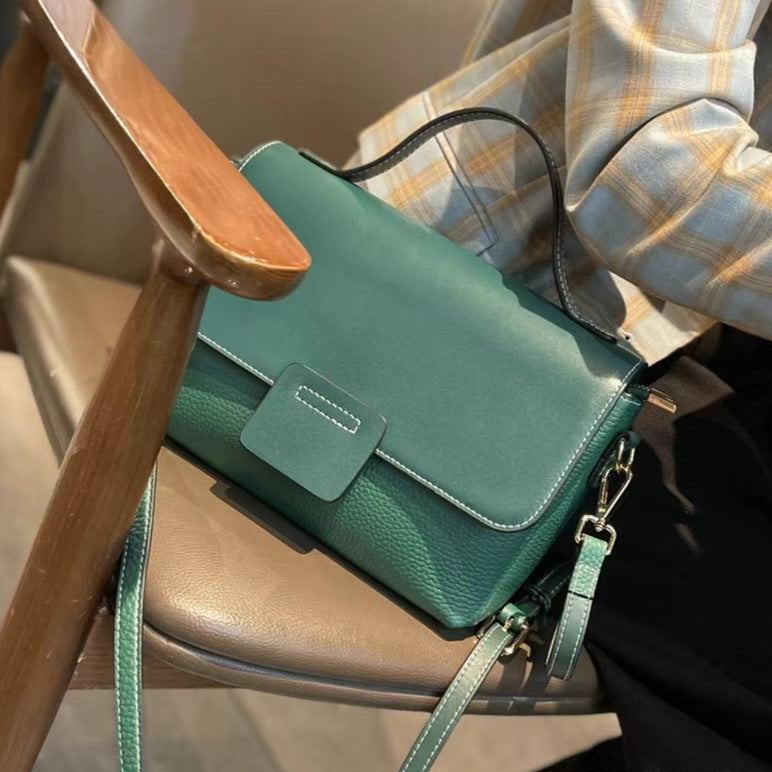 Leather Handbags New Style Single-shoulder Messenger BagThis leather handbag is a must-have for any fashion-forward individual. Made with high-quality leather, it exudes a retro vibe with its belt decoration and car stitcHandbagsPlush Fashions ShopPlush Fashion Shop