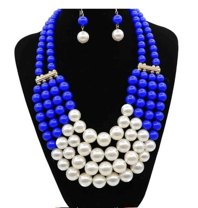 Multi Simulated Pearl Bohemian Jewelry Set with blue and white beads on a black display.