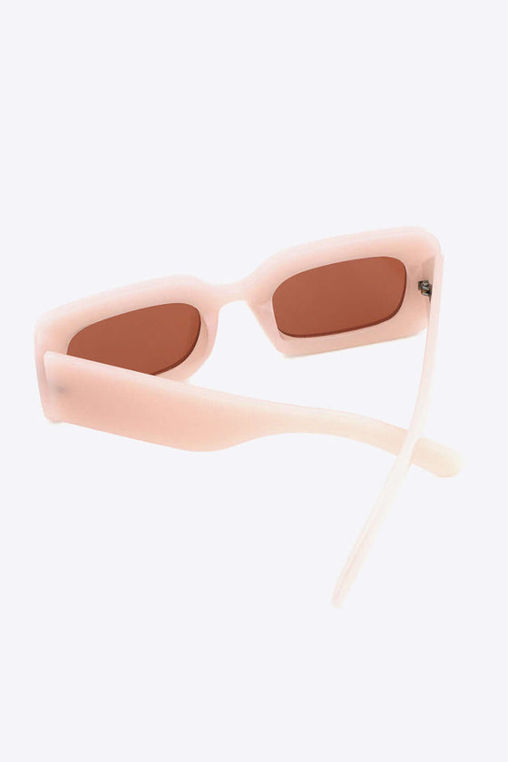 Polycarbonate Frame Rectangle SunglassesProtect your eyes in style with our Polycarbonate Frame Rectangle Sunglasses! Featuring a durable polycarbonate frame and lens, these sunglasses not only provide UV4Sun glassesPlush Fashion ShopPlush Fashion ShopPolycarbonate Frame Rectangle Sunglasses