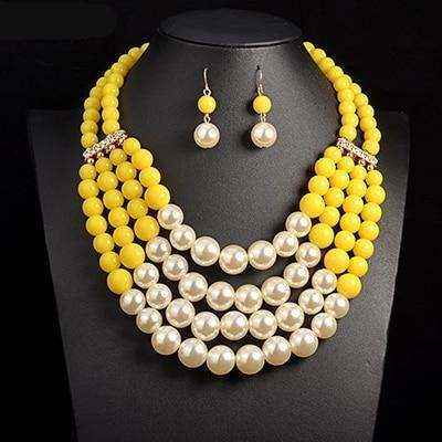 Multi simulated pearl Bohemian jewelry set with yellow beads and matching earrings.