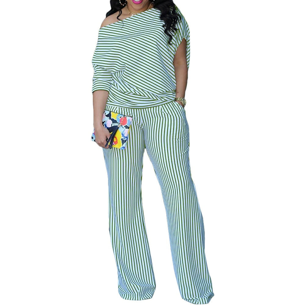 Women's Casual Asymmetric Sleeve Shirt with Pant SetUnleash your inner fashionista with our Volunteer fabric Casual Sleeve Asymmetric Shoulder Suit! This bold and unique suit features a stripe and plaid pattern in whi2 piece Pants setPlush Fashions ShopPlush Fashion Shop