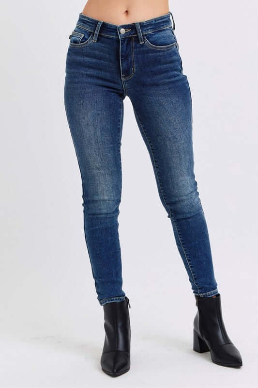 Judy Blue Full Size Run Mid-Rise Waist Skinny Jeans with Thermal Lining for warmth and style.