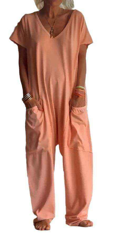 Womens solid color V-neck oversized pocket jumpsuit with quarter sleeves.