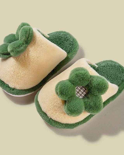 Parent-child cartoon indoor non-slip cotton slippers with flower design and soft soles in green.