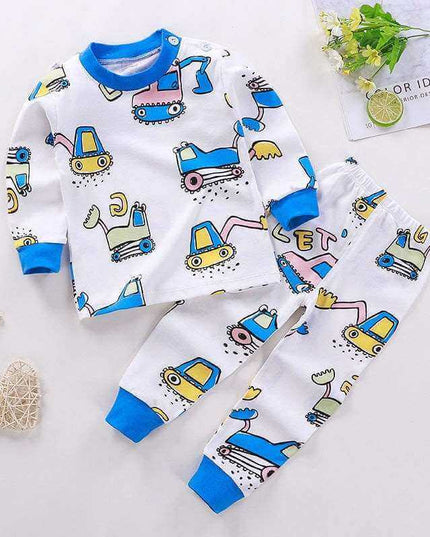 Children's cotton pajamas for boys and girls with colorful vehicle print and blue cuffs.