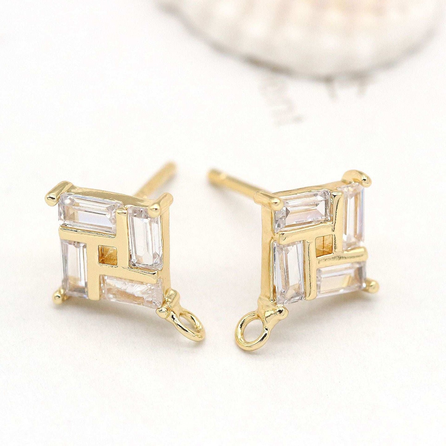 Stone Plated 14K Real Gold EarringsExperience the luxurious beauty of our Stone Plated 14K Real Gold Earrings. The mirror polishing technology and hand-polished 925 silver needle ensure excellent shinearingsPlush Fashions ShopPlush Fashion Shop