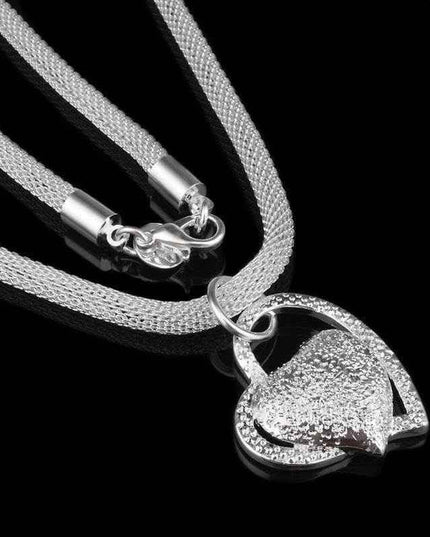 Fine Jewelry Silver Net Style Heart Necklace with electroplated silver finish.