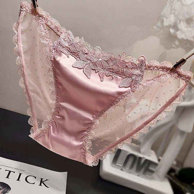 Mesh see-through pink low waist women's underwear with lace trim, offering comfort and style.