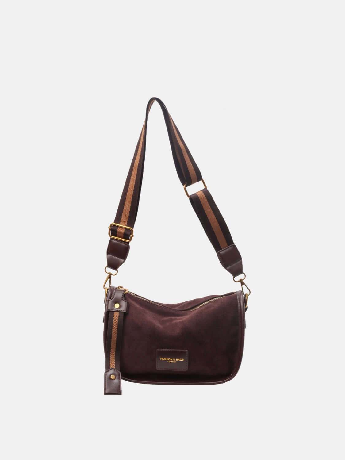 Suede adjustable strap women's shoulder bag with brown and black accents.