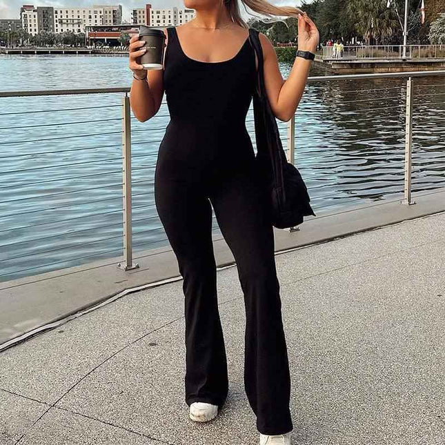 Slim fit hip raise jumpsuit in black, backless design, breathable polyester fabric, stylish activewear, sizes S-XL.