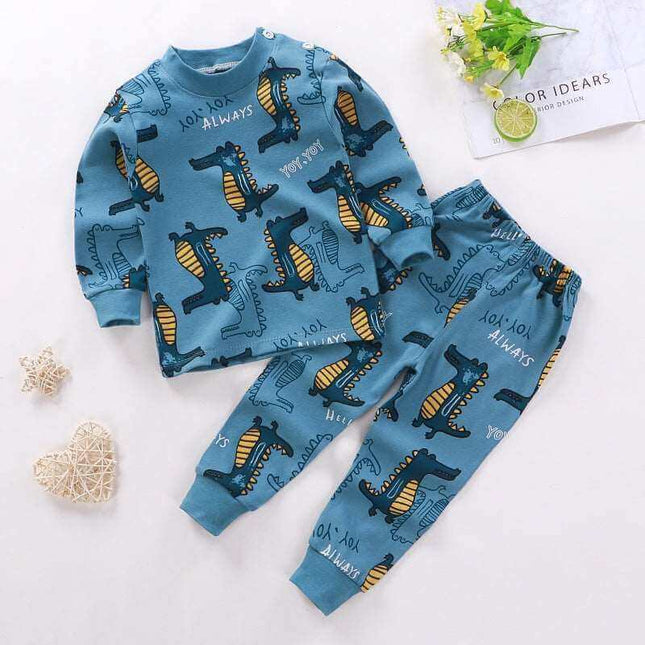 Boys and girls children's cotton pajamas with dinosaur print for a cozy sleep.