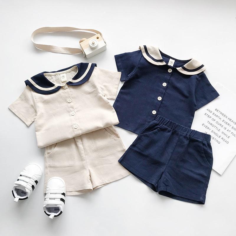 Boys and girls Navy solid short sleeves setsGear up for summer with our boys and girls Navy solid short-sleeved sets! Made with 90% cotton, these two-piece pants suits are perfect for both boys and girls. Say Infant setsPlush Fashions ShopPlush Fashion Shop