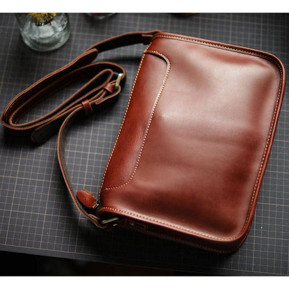 Mens Handmade Leather Casual Crossbody BagIndulge in practical luxury with our Mens Handmade Leather Casual Shoulder Crossbody Bag. Made from premium cowhide, this fashionable and simple bag features a solidCross body bagsPlush Fashions ShopPlush Fashion ShopMens Handmade Leather Casual Crossbody Bag