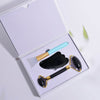 Beauty Face Care Massage Jade Device in box with brush and roller for skincare routine.