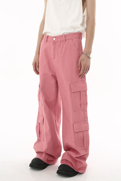 Wide leg cargo jeans in pink with side pockets for casual style.