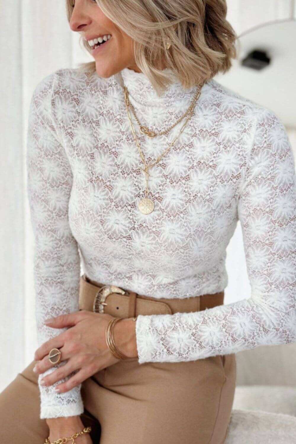 Mock Neck Long Sleeve Lace Top in semi-sheer material worn by model.