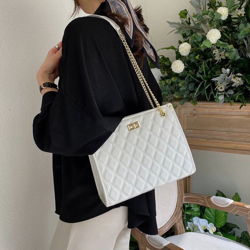 Women's Tote Handbags New Style, Stylish, Large-capacityUpgrade your street style with our Tote Handbags! Made with high-quality PU material, these bags feature trendy embossing and a spacious box design. The soft surfaceHandbagsPlush Fashions ShopPlush Fashion Shop