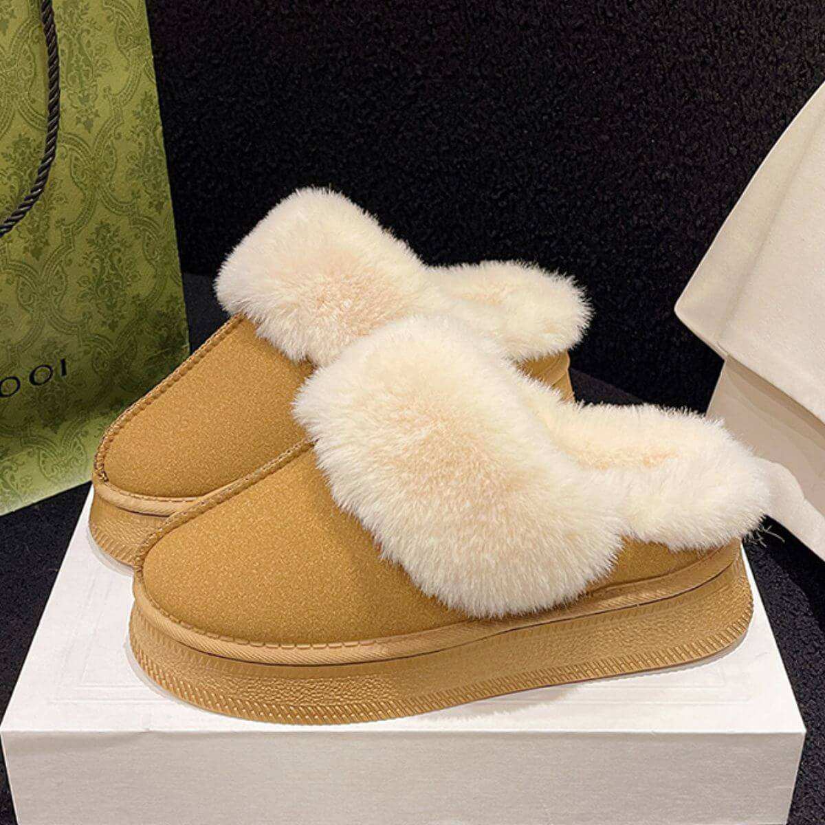 Suede Soft Round Toe Platform Slippers with faux fur on display.