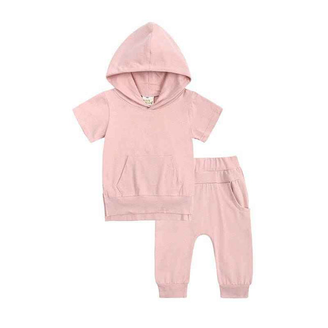 Boys and girls fashion short-sleeved hooded top and casual pants set in pink.