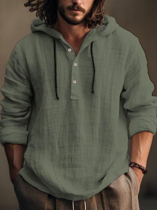 Men's full-size half button long sleeve hoodie in green cotton.