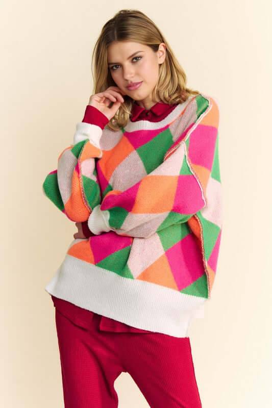 Davi & Dani Exposed Seam Color Block Sweater with bold design and relaxed fit.