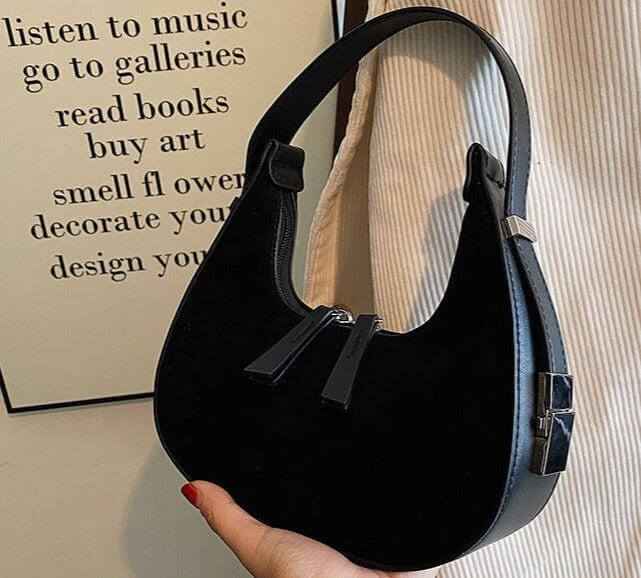 Fashion high-grade matte French handbag with a sleek design in black, featuring a single shoulder strap and soft handle.