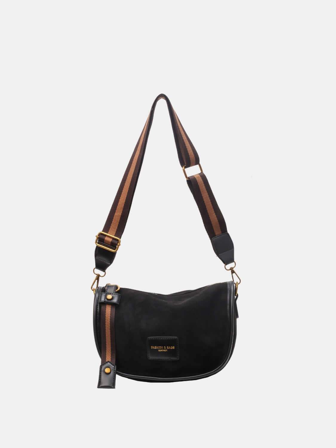 Suede adjustable strap women's shoulder bag in black with spacious design.