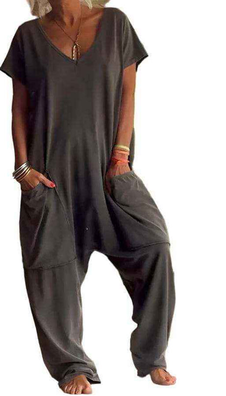 Womens solid color V-neck oversized pocket jumpsuit, street fashion style.