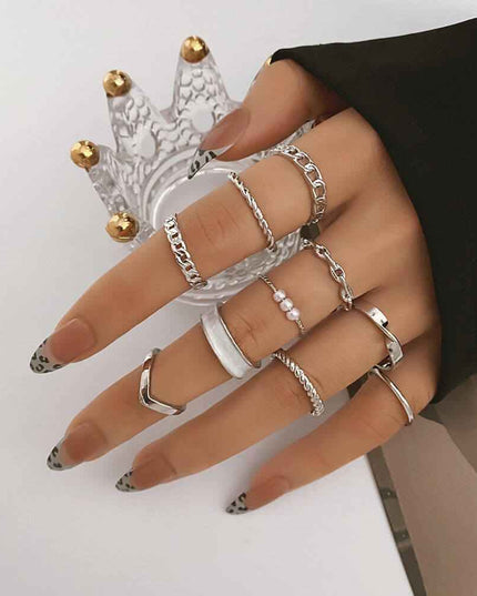 Women's Butterfly Pearl Ring with 10-piece metal set, geometric retro design.