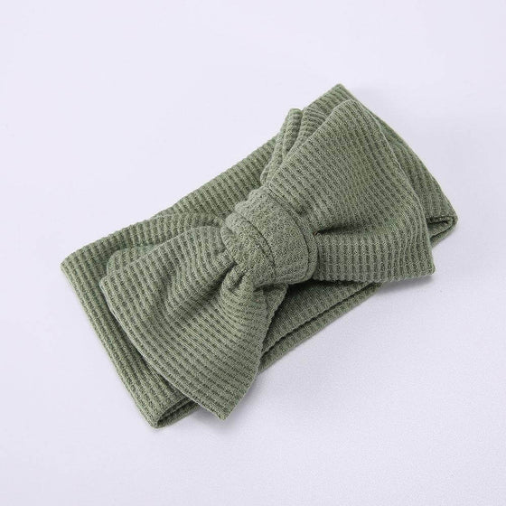 Infant Oversized Bow Hair BandAdd the perfect finishing touch to your little one's outfit with our Infant Oversized Bow Hair Band. Made with high-quality fabric and crafted with knitting technolohead bandPlush Fashions ShopPlush Fashion ShopInfant Oversized Bow Hair Band