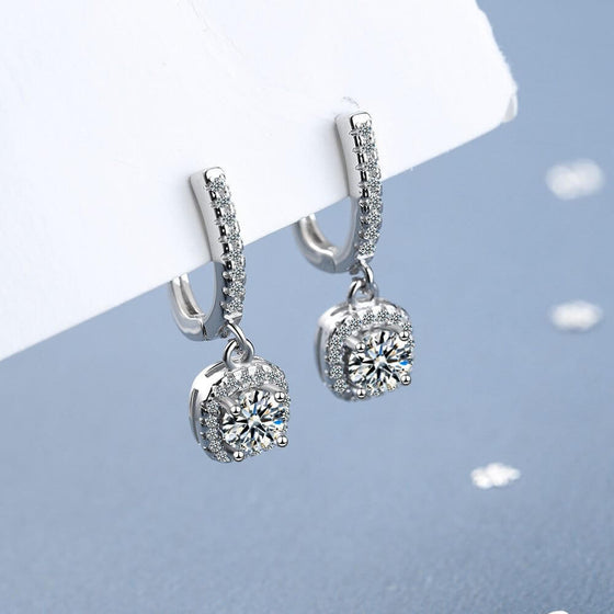 Diamond inlaid short hollow zircon earrings with copper-white gold plating.