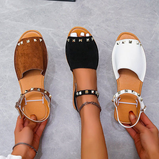 Rivet Sandals Summer Fish Mouth Shoes For Women Flat Beach ShoesElevate your summer shoe game with our Rivet Sandals! These Roman style sandals feature a comfortable fish mouth toe shape and a shallow mouth design. The frosted prSandalsPlush Fashions ShopPlush Fashion Shop