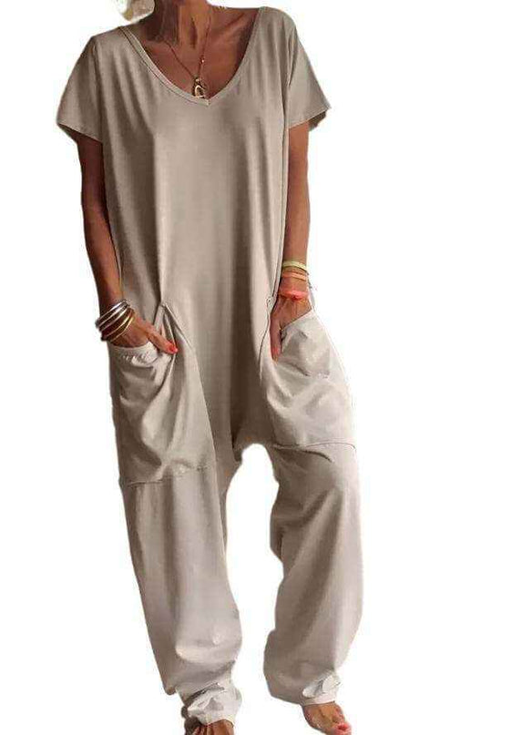 Womens solid color v-neck oversized pocket jumpsuit in beige.