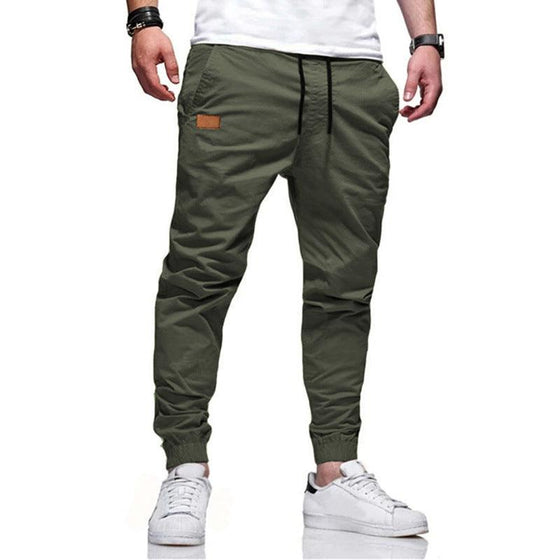 Youth fashion casual tether loose cargo ankle banded pants in green with a straight-leg design.