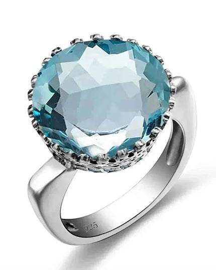 925 sterling silver ring with 15ct round aquamarine stone.