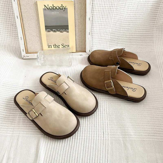 Suede Round Toe Slip-Ons for women displayed on a white surface.