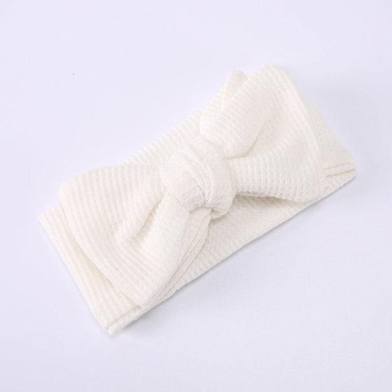 Infant Oversized Bow Hair BandAdd the perfect finishing touch to your little one's outfit with our Infant Oversized Bow Hair Band. Made with high-quality fabric and crafted with knitting technolohead bandPlush Fashions ShopPlush Fashion ShopInfant Oversized Bow Hair Band