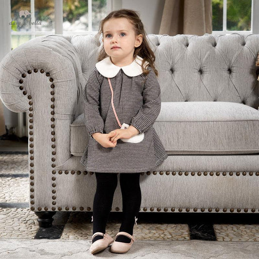 Winter Girl's Plaid Dress Children's ClothingIntroduce your little girl to style and comfort with our Winter Girl's Plaid Dress! Combining a trendy European and American design with a durable A-line skirt, thistoddler dressPlush Fashions ShopPlush Fashion Shop